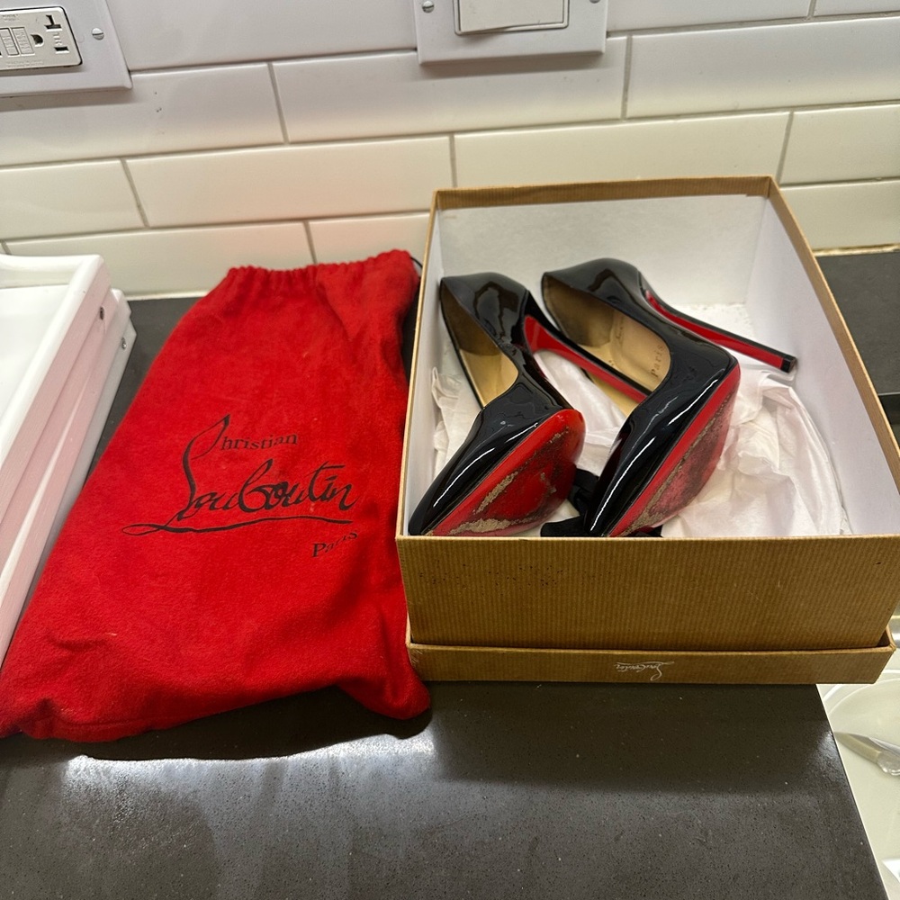 Christian Louboutin Black Heels with Red Soles